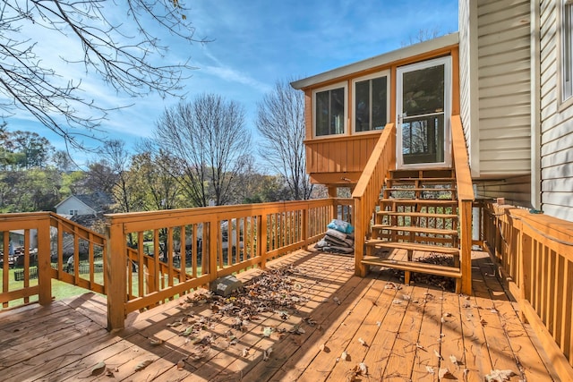 wooden terrace featuring a sunroom