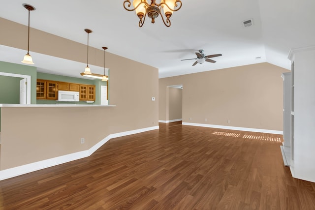 unfurnished living room with wood-type flooring, ceiling fan with notable chandelier, and vaulted ceiling