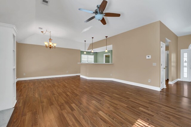 unfurnished living room with ceiling fan with notable chandelier, lofted ceiling, and dark wood-type flooring