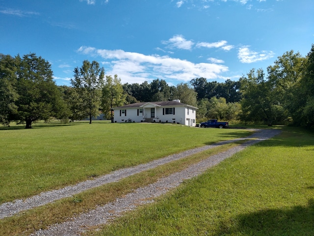 view of front of property with a front lawn