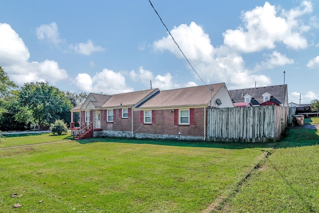 exterior space with a front lawn