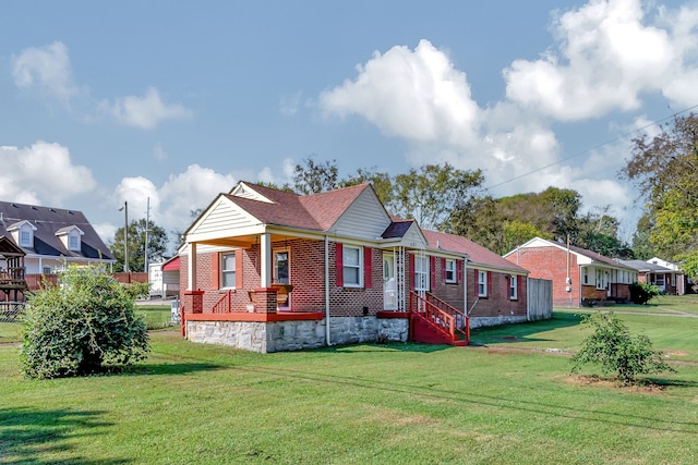 view of front of home with a front lawn