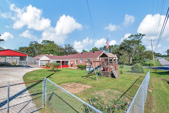 view of jungle gym featuring a lawn