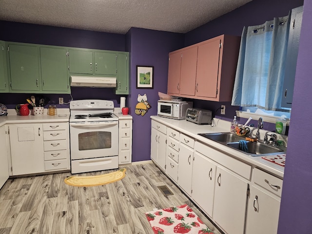 kitchen with light hardwood / wood-style floors, white appliances, sink, and white cabinets