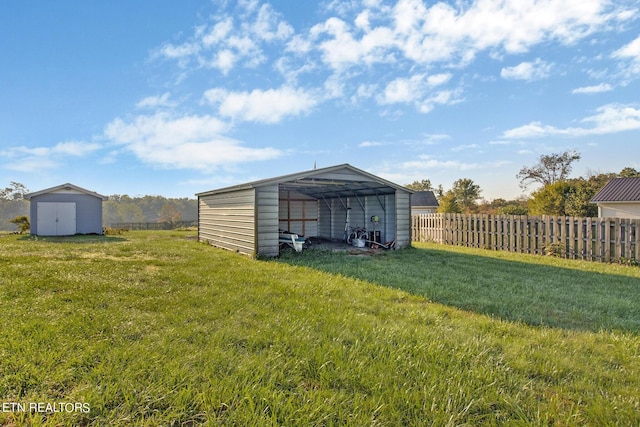 view of shed featuring fence