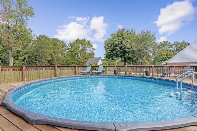 view of pool with a deck