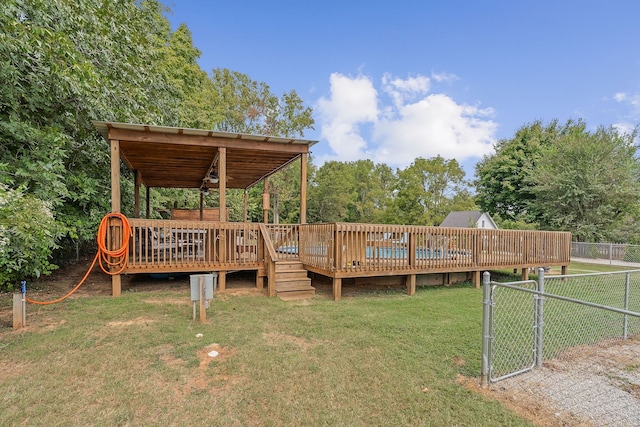 wooden deck with a lawn