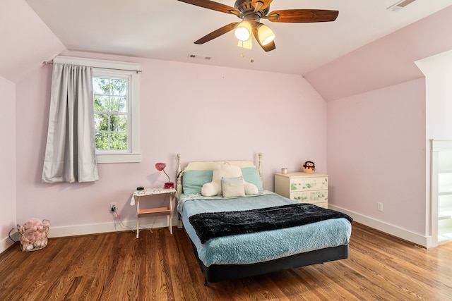 bedroom with vaulted ceiling, hardwood / wood-style floors, and ceiling fan