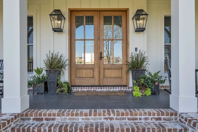 entrance to property with a water view