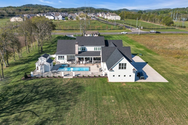 drone / aerial view featuring a mountain view