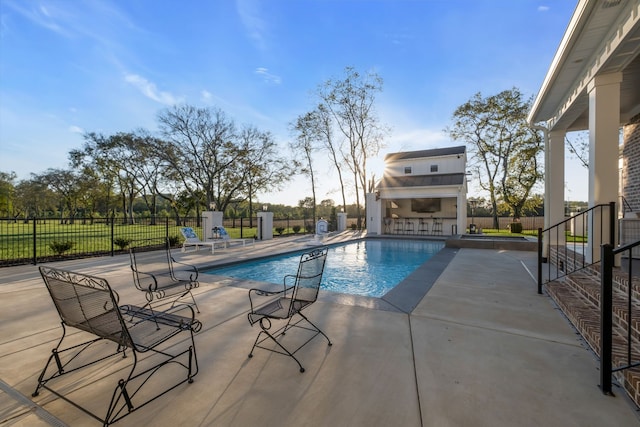 view of pool featuring a patio