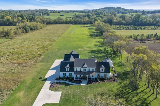 birds eye view of property featuring a rural view