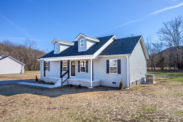 view of front facade featuring a shingled roof, crawl space, central AC, and covered porch