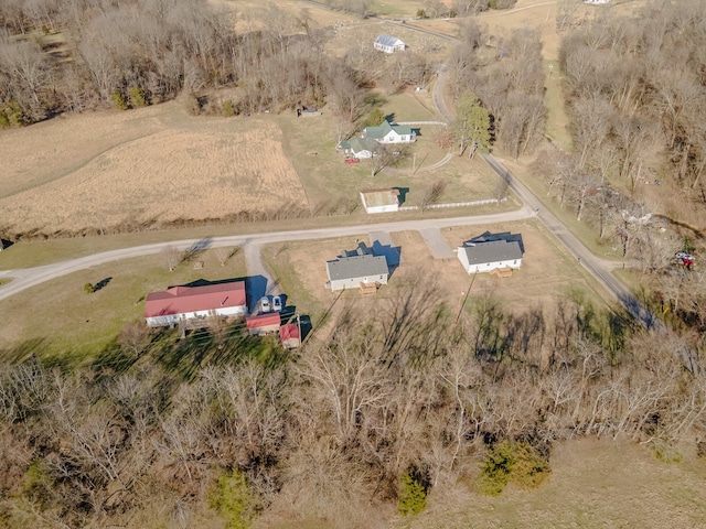 birds eye view of property featuring a rural view