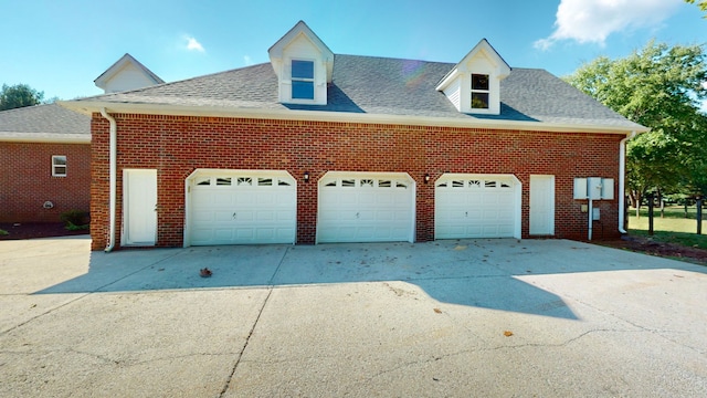 exterior space with a garage