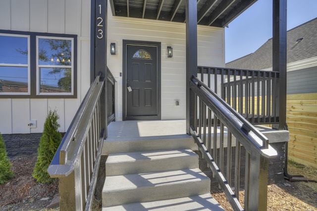 doorway to property with a porch