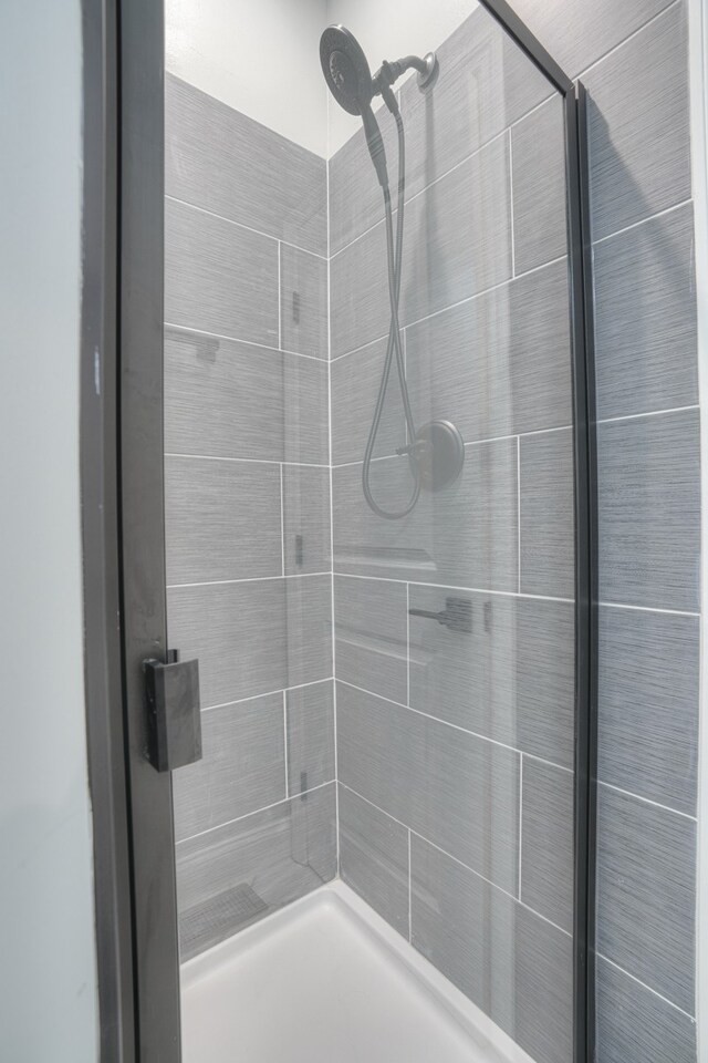 bathroom featuring walk in shower