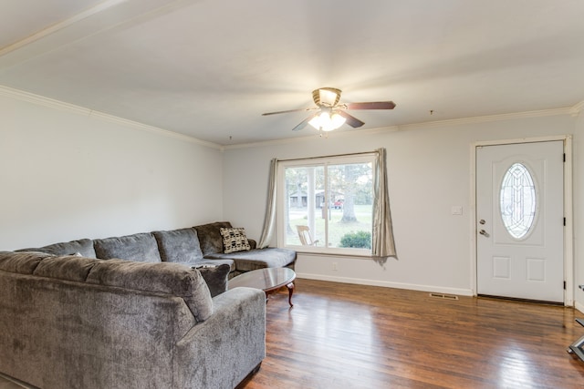 living room with ceiling fan, dark hardwood / wood-style floors, and crown molding