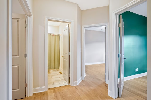 hall featuring light hardwood / wood-style flooring