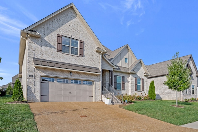 view of front of house featuring a front yard and a garage