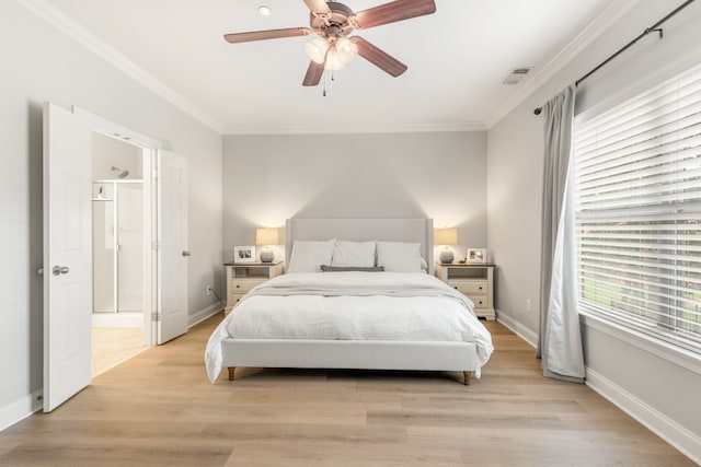 bedroom with ceiling fan, ornamental molding, and light hardwood / wood-style floors