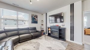 living room featuring light hardwood / wood-style floors and a fireplace