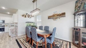 dining space with light hardwood / wood-style flooring and a healthy amount of sunlight