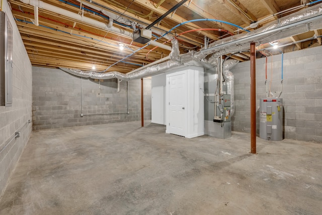 basement with heating unit and electric water heater