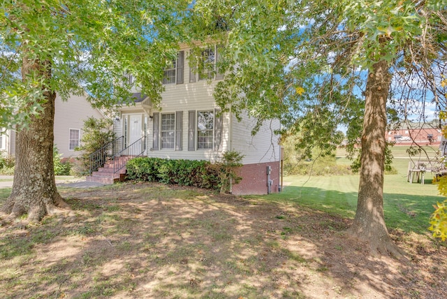 view of front of house with a front yard