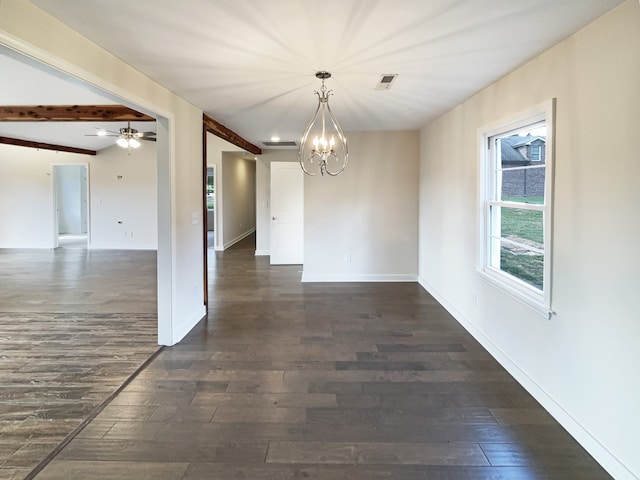 spare room featuring ceiling fan with notable chandelier, lofted ceiling with beams, and dark hardwood / wood-style floors