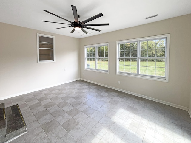 spare room featuring ceiling fan