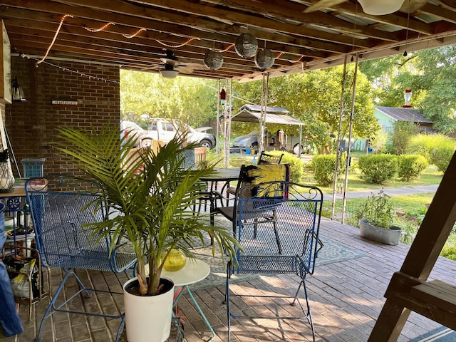 view of patio with ceiling fan