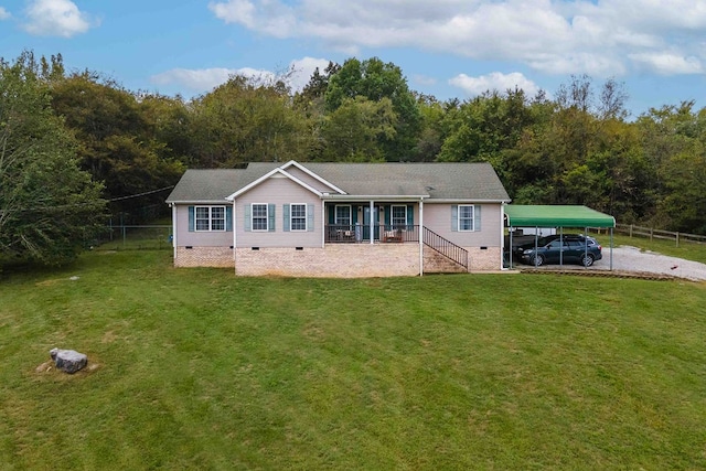 back of property featuring a carport, a yard, and a porch