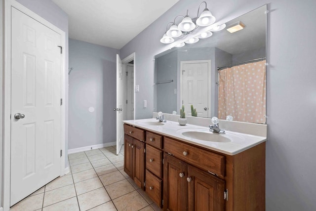 bathroom with vanity and tile patterned flooring