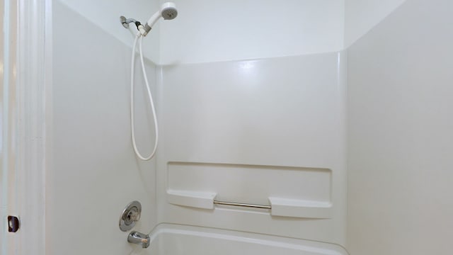 bathroom with shower / bathtub combination