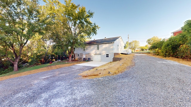 exterior space with a garage