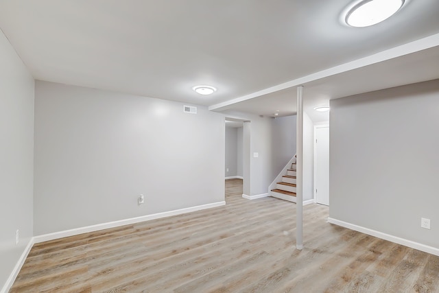 basement with light wood-type flooring