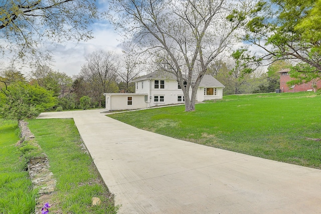 view of front of property with a front lawn