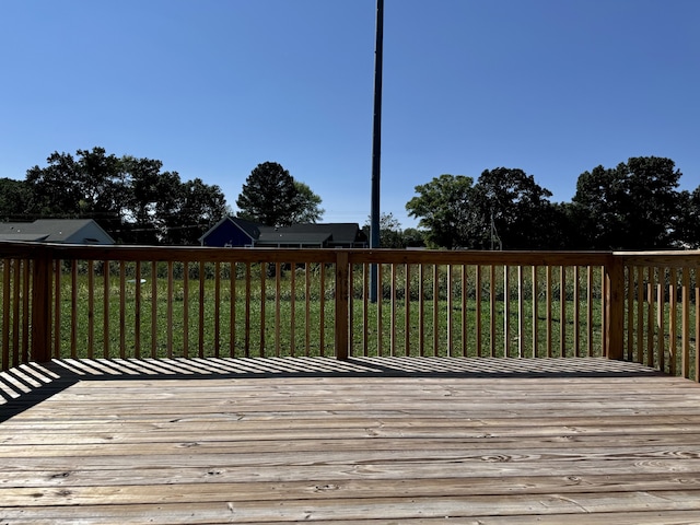 deck featuring a yard