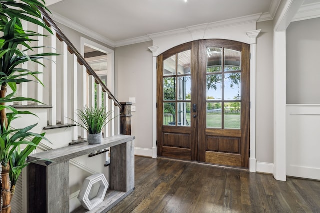 entryway featuring crown molding, dark hardwood / wood-style flooring, and french doors