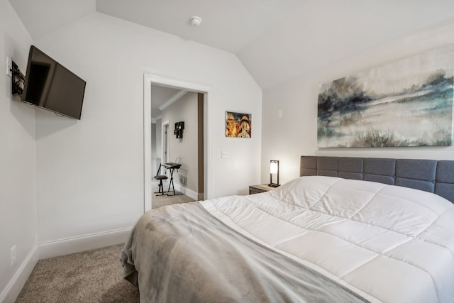 bedroom featuring vaulted ceiling and light carpet