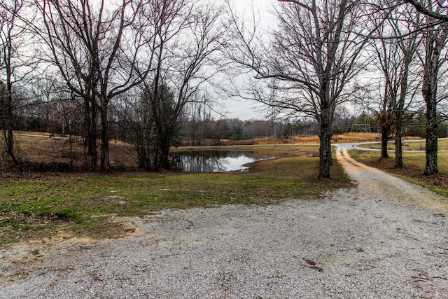 view of road featuring a water view