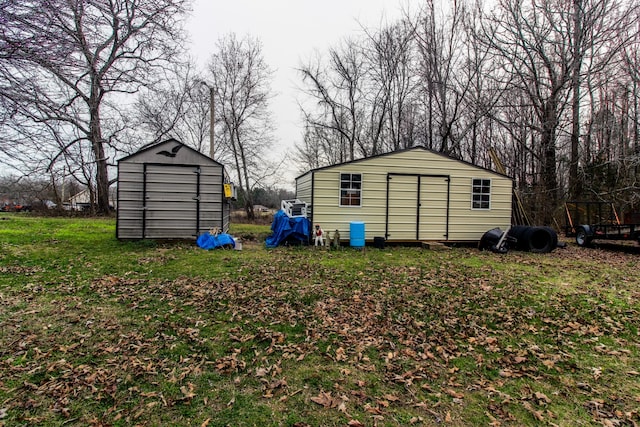 view of outbuilding featuring a lawn