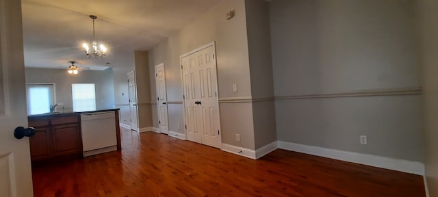 kitchen featuring ceiling fan with notable chandelier, white dishwasher, pendant lighting, and dark hardwood / wood-style floors