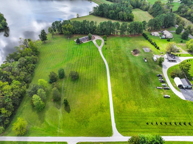 birds eye view of property featuring a rural view and a water view