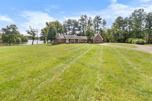 view of yard with a water view