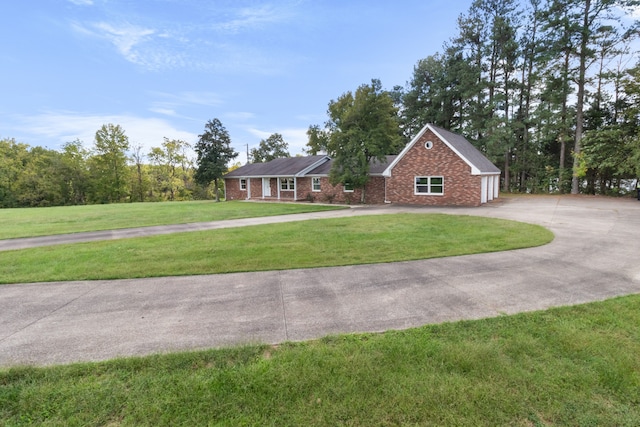 ranch-style house with a front lawn