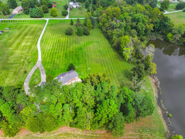 birds eye view of property featuring a rural view and a water view