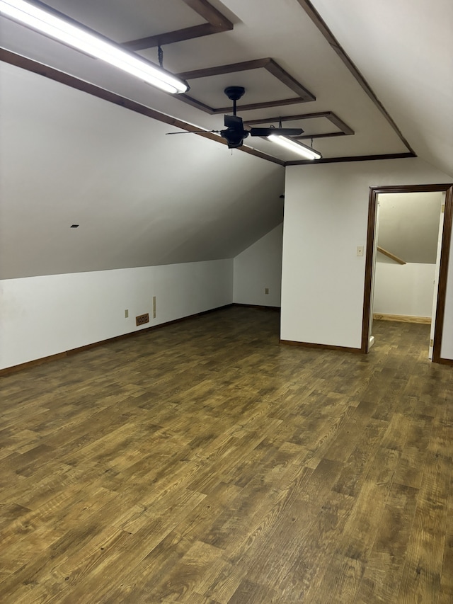 bonus room with ceiling fan, lofted ceiling, and dark hardwood / wood-style flooring