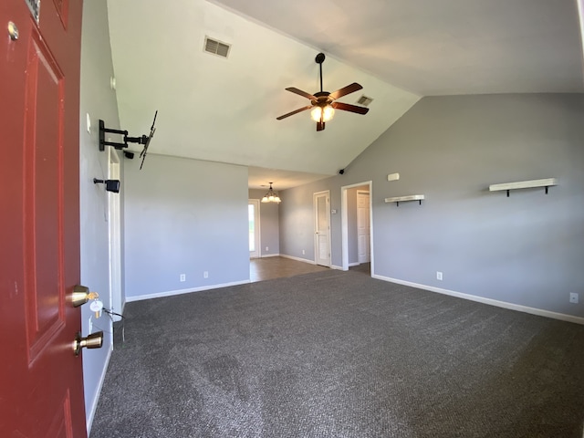 carpeted spare room featuring ceiling fan and high vaulted ceiling